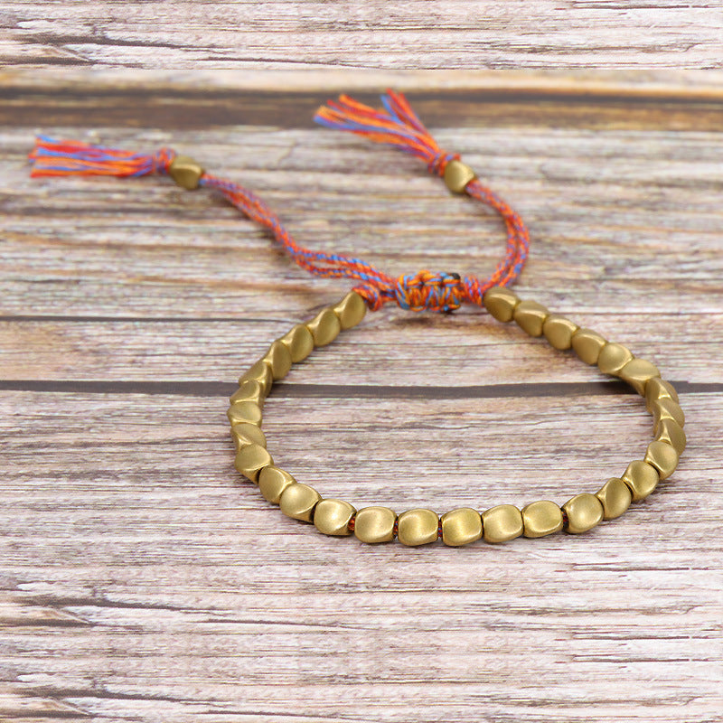 Handwoven Adjustable Tassel Bracelet — Boho Rope Bracelet with Unique Brass Beads