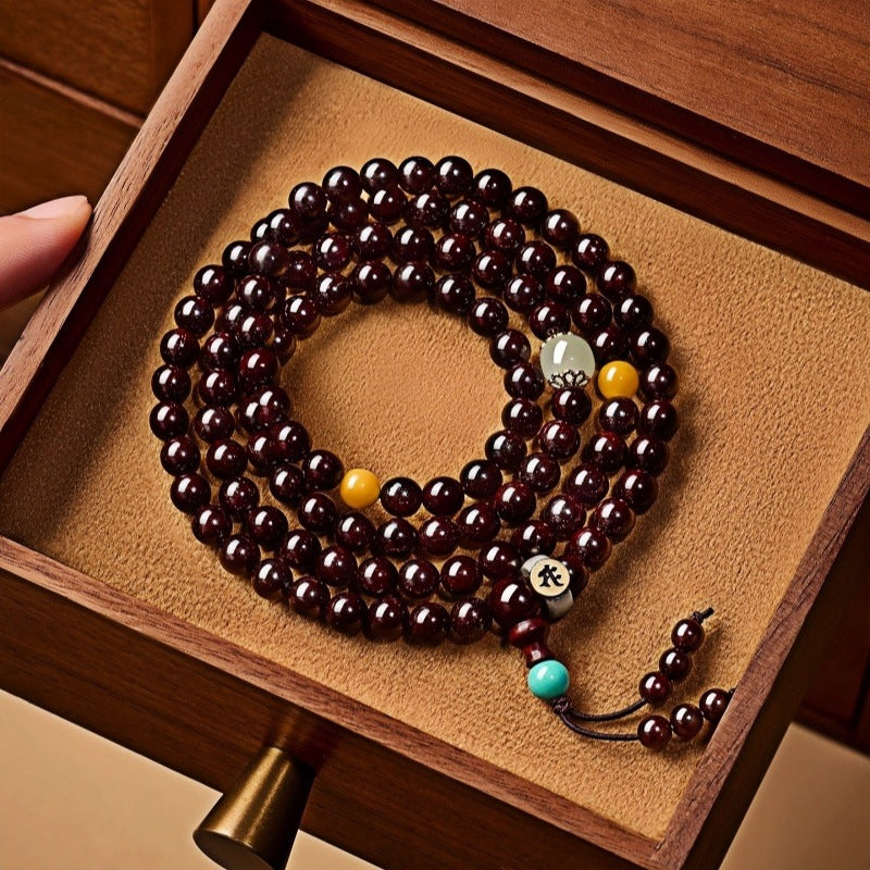 108-Bead Blood Sandalwood Mala Bracelet with Golden Star Pattern – Unisex Spiritual Jewelry - aurimala2