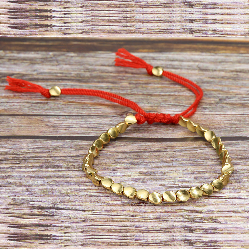 Handwoven Adjustable Tassel Bracelet — Boho Rope Bracelet with Unique Brass Beads