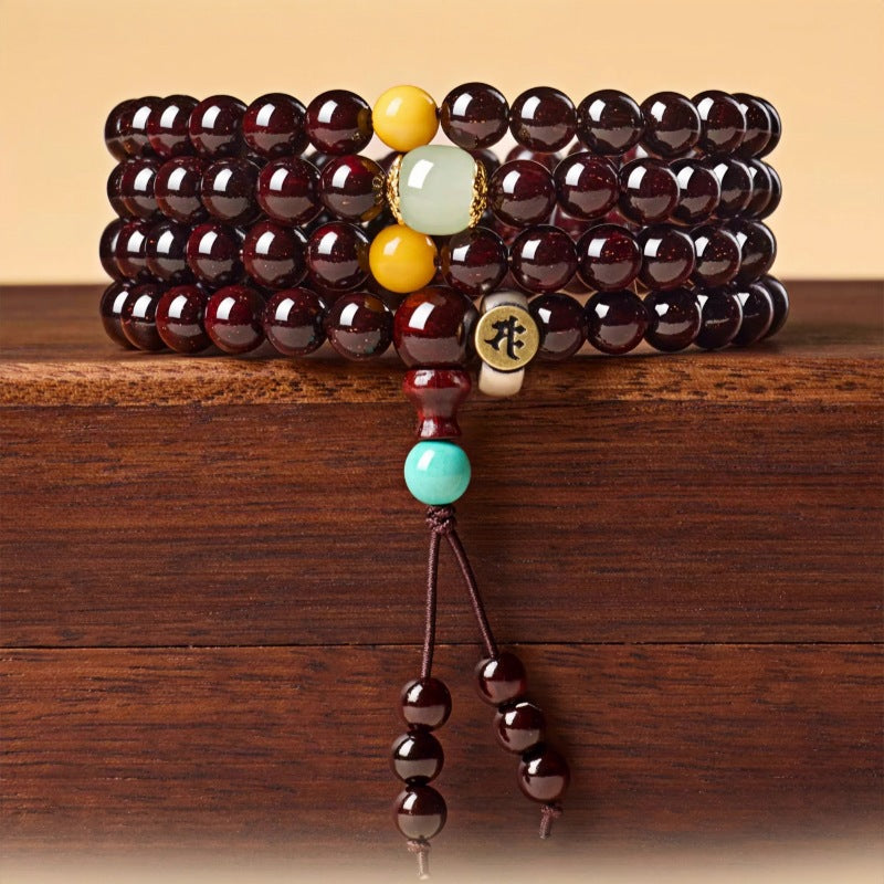 108-Bead Blood Sandalwood Mala Bracelet with Golden Star Pattern – Unisex Spiritual Jewelry - aurimala1