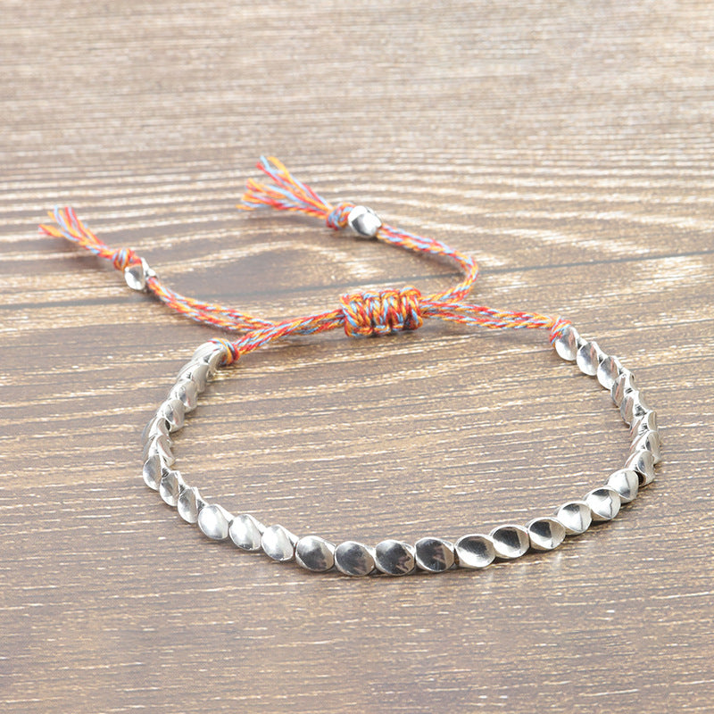 Handwoven Adjustable Tassel Bracelet — Boho Rope Bracelet with Unique Brass Beads