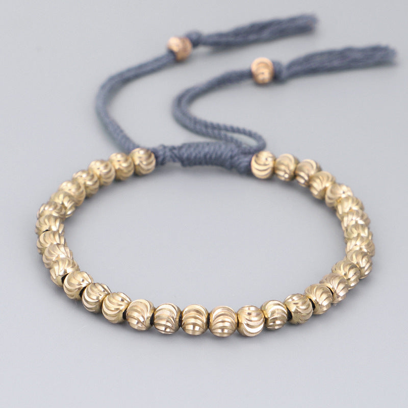 Handwoven Brass Barrel Bead Bracelet — Rotating Charm, Creative Rope Jewelry for Mindful Living